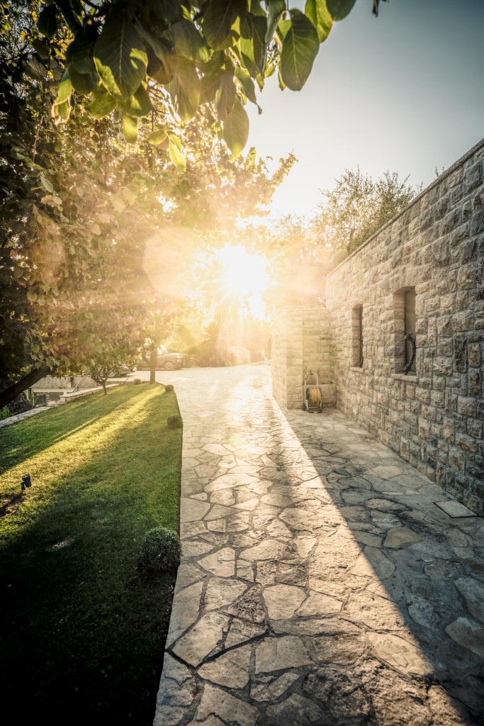 Evening light on the stone path to the Castel Savina winery and cellar