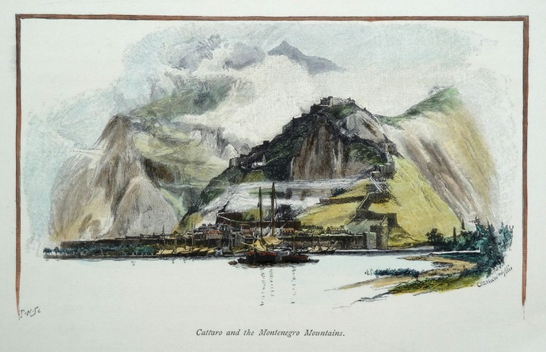 Historical view of a fortified town on the Bay of Kotor with mountains rising behind